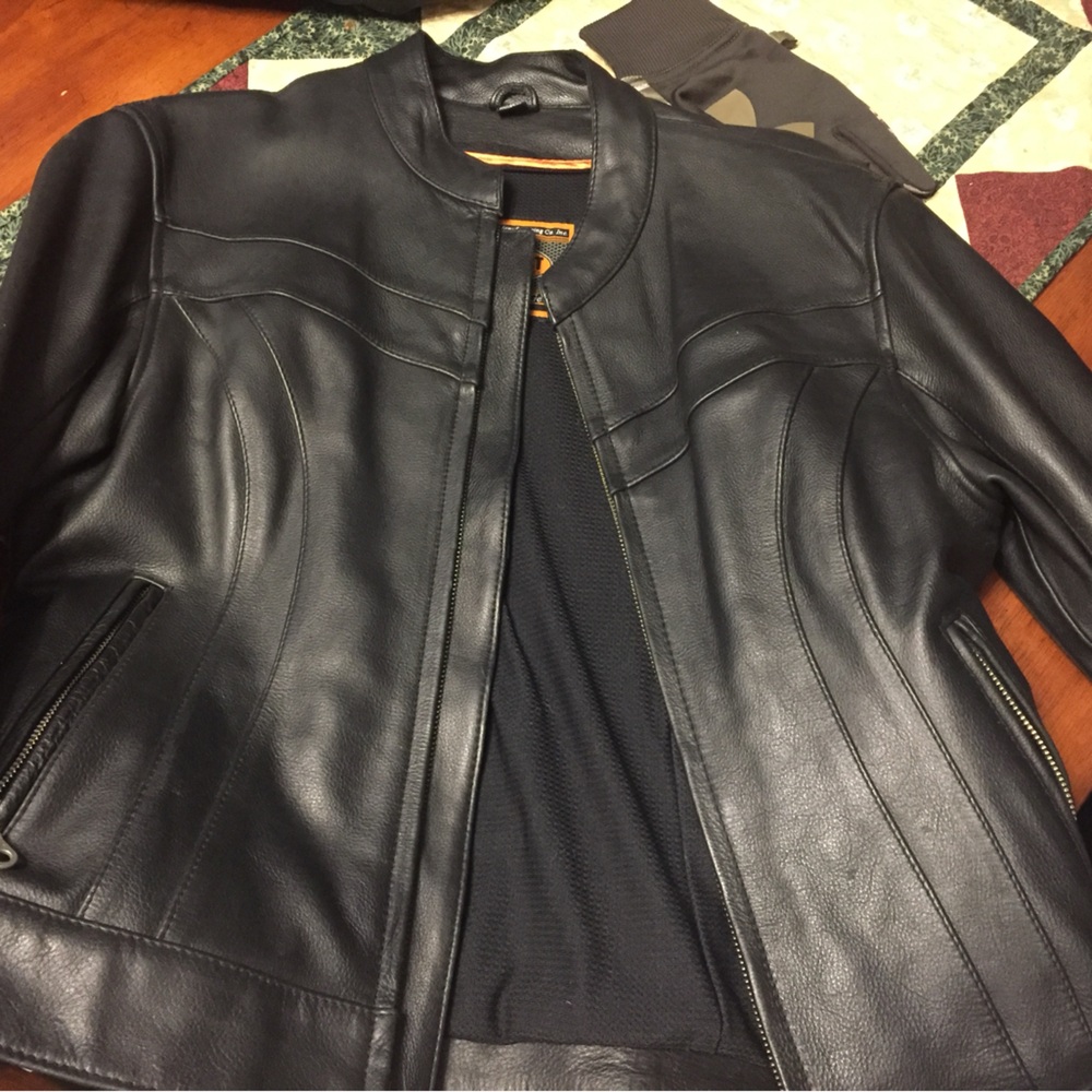 Black leather women’s motorcycle jacket size Medium